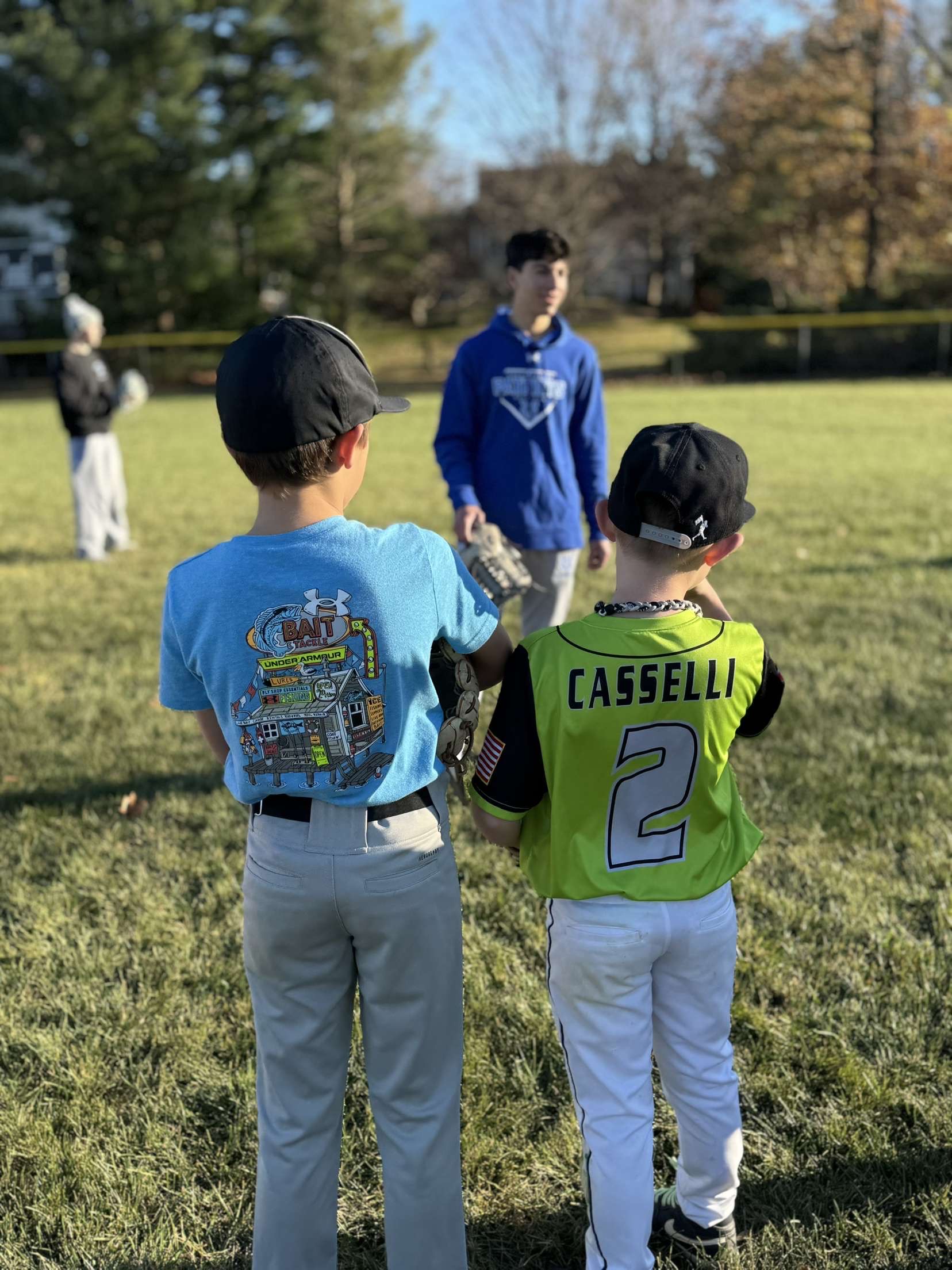 Kids learning from teen mentors